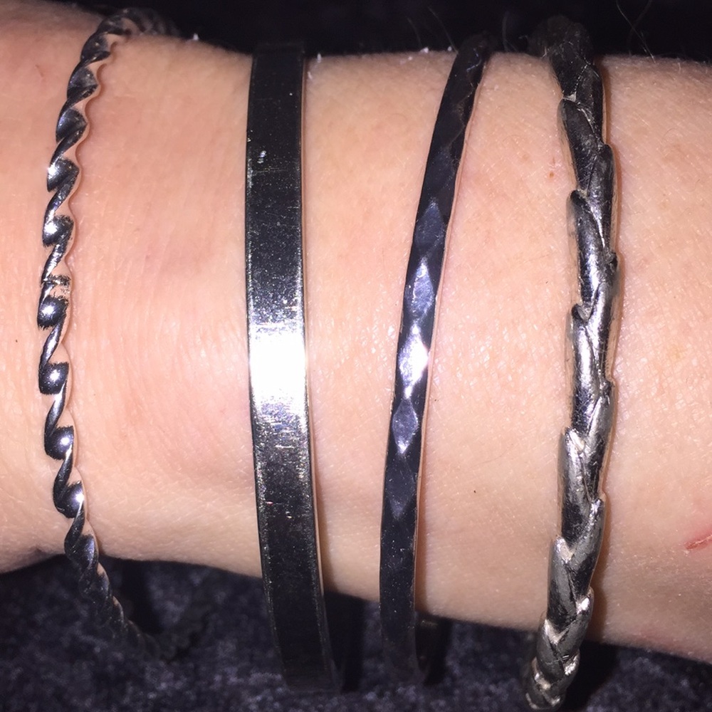 Lot of bangle bracelets.